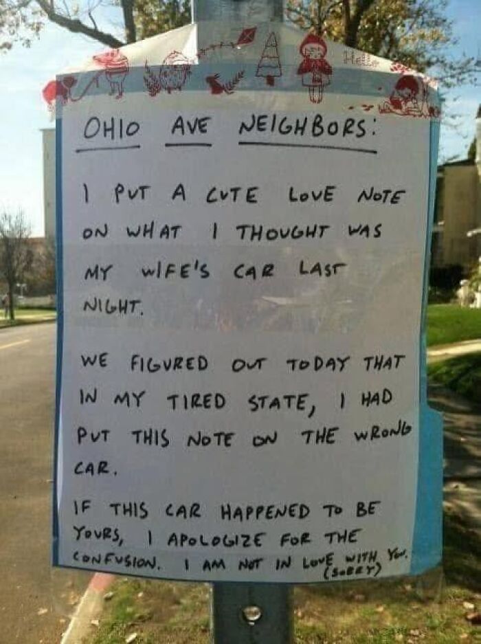 Funny neighbor's sign apologizing for putting love note on wrong car