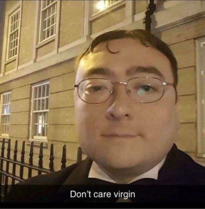 Man with glasses outside with caption indicating indifference