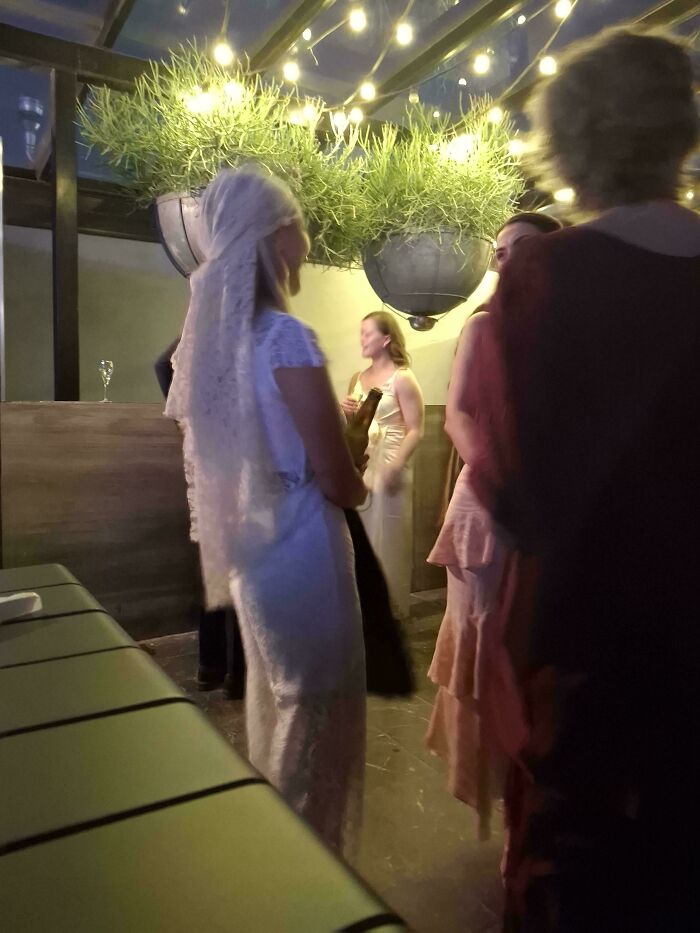 Guest In White Lace With Matching Headress
