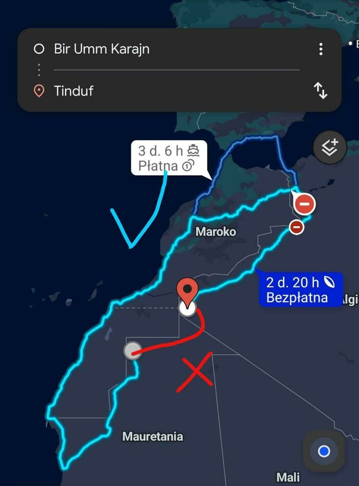 Google Maps shenanigans route map with blue and red lines and travel details in dark mode