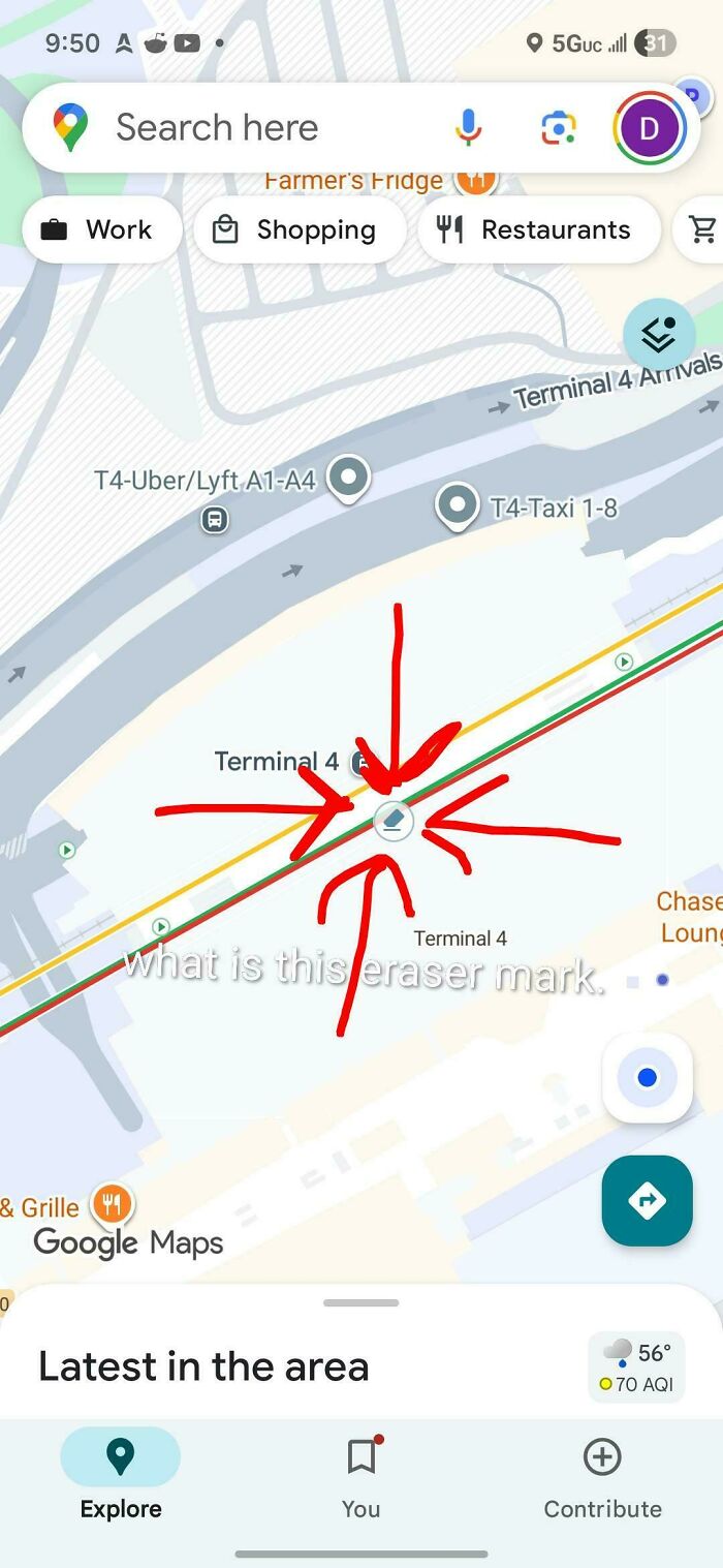 Google Maps map of Terminal 4 with red arrows pointing to an eraser mark anomaly