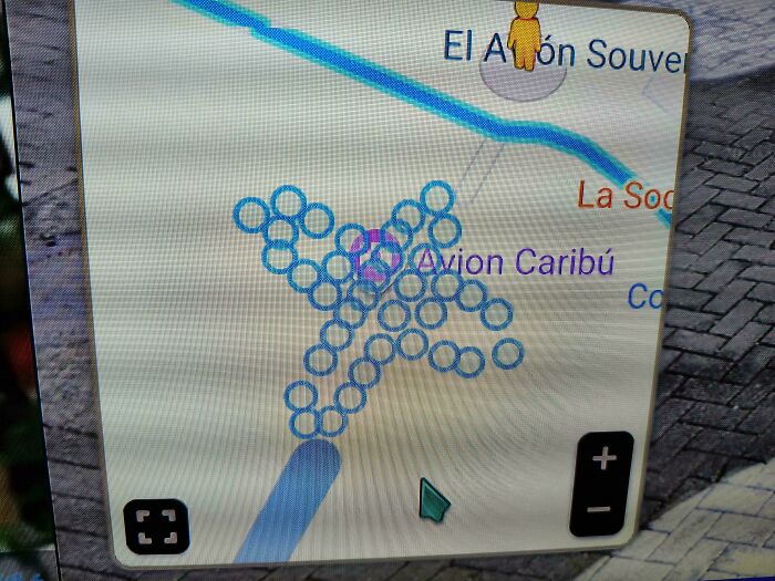 Google Maps showing a puzzling airplane shape made of blue circular icons