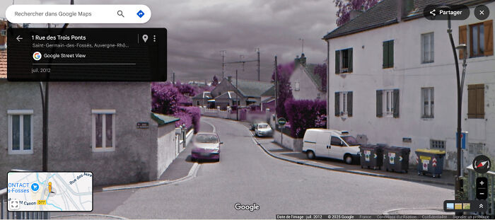 Google Maps street view of a residential street in Saint Germain with purple hue effect