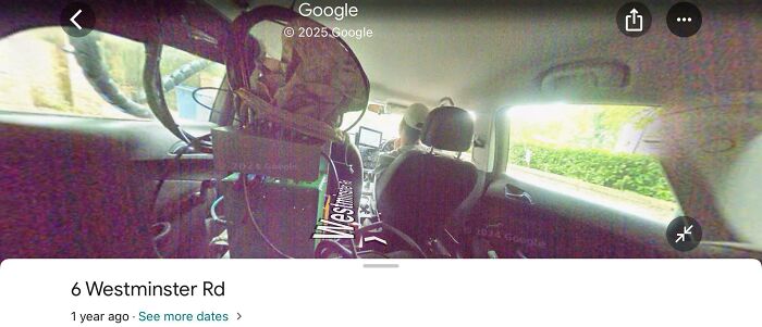 Inside a car with camera gear capturing Google Maps street view images