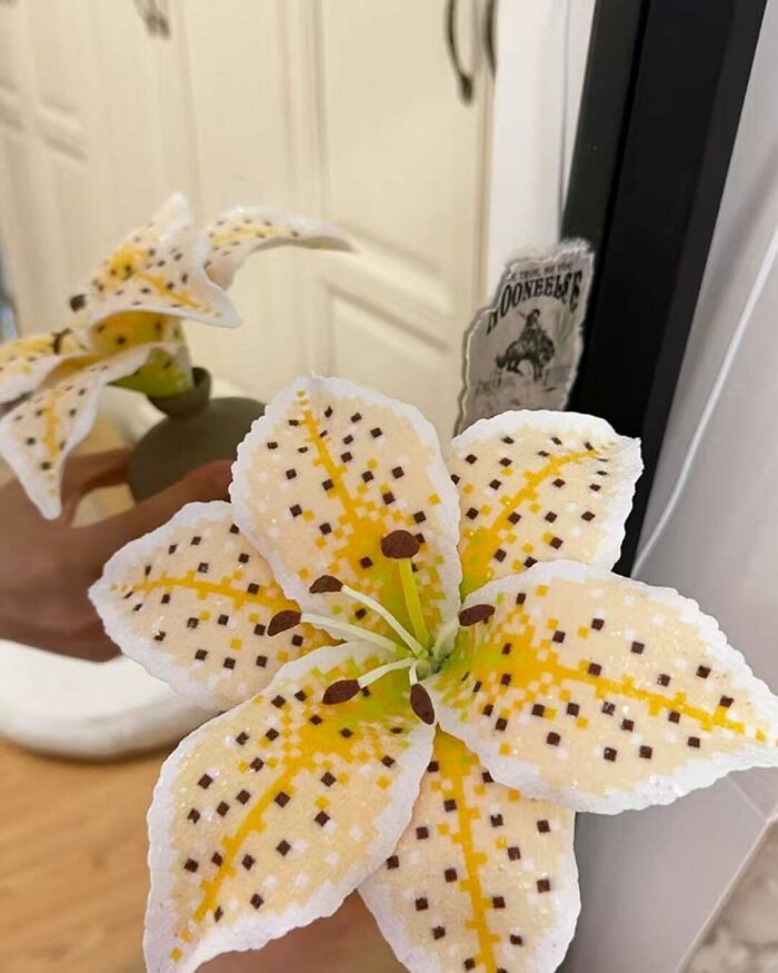 Close-up of a beautiful handmade flower with intricate details, showcasing talent and patience.