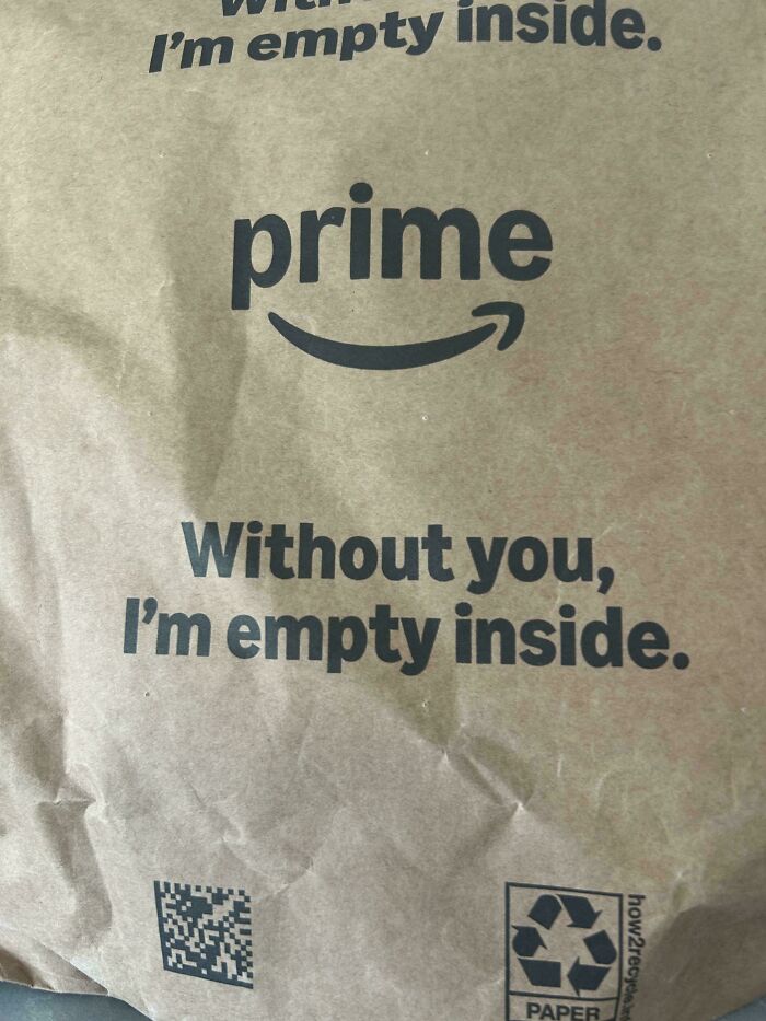 An Amazon Prime bag with the text Without you, Im empty inside, reflecting on consumerism.