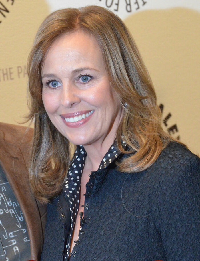 Portrait of actress Genie Francis at a public event showcasing her career highlights