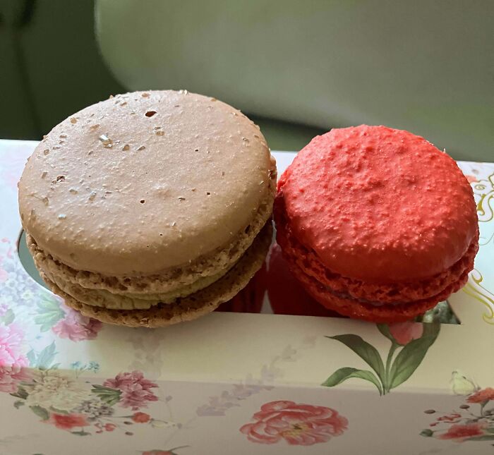 Macaron comparison showing one larger and one smaller cookie side by side