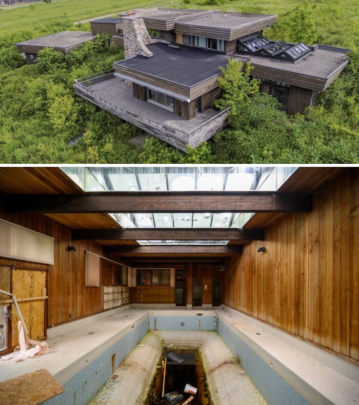 Overgrown abandoned mansion surrounded by dense greenery aerial view
