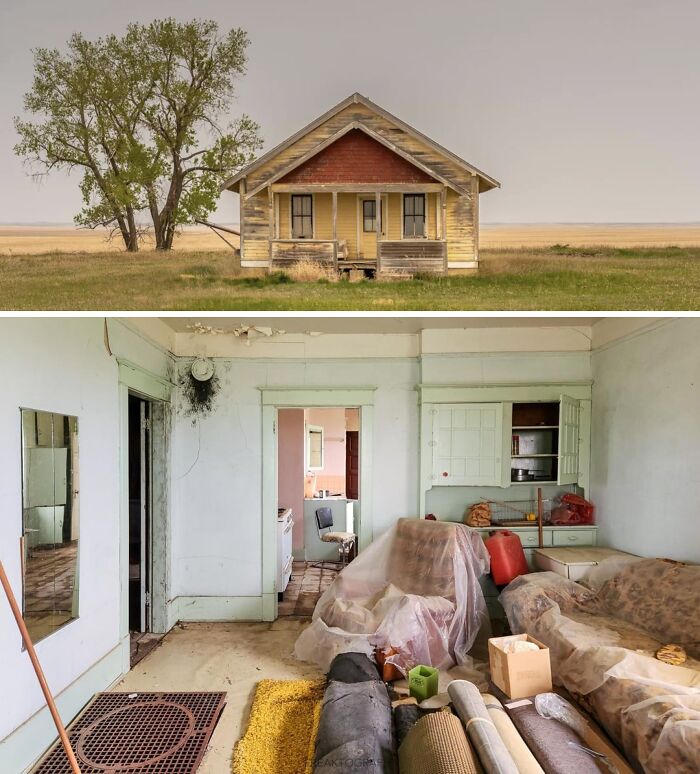 Interior cluttered living room of abandoned rural house with peeling walls