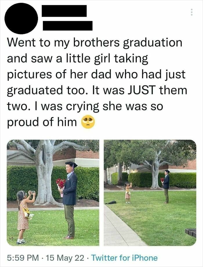 Father and daughter at graduation with daughter taking pictures showing pride