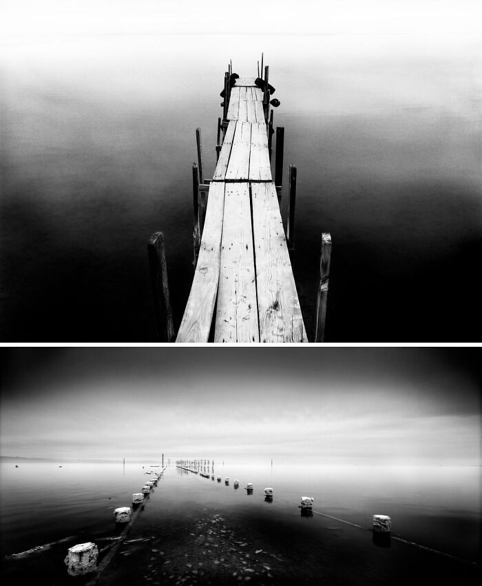 Wooden pier stretching into foggy water in a minimalistic backrooms scene