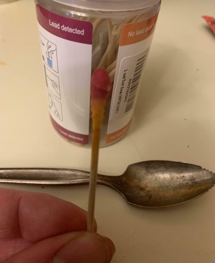 Lead detected matchstick near spoon and lead test kit