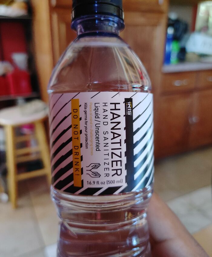 Bottle of hand sanitizer with clear label warning not to drink