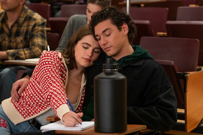 Bridgerton couple studying together in a classroom setting Bridgerton couple studying together in a classroom setting