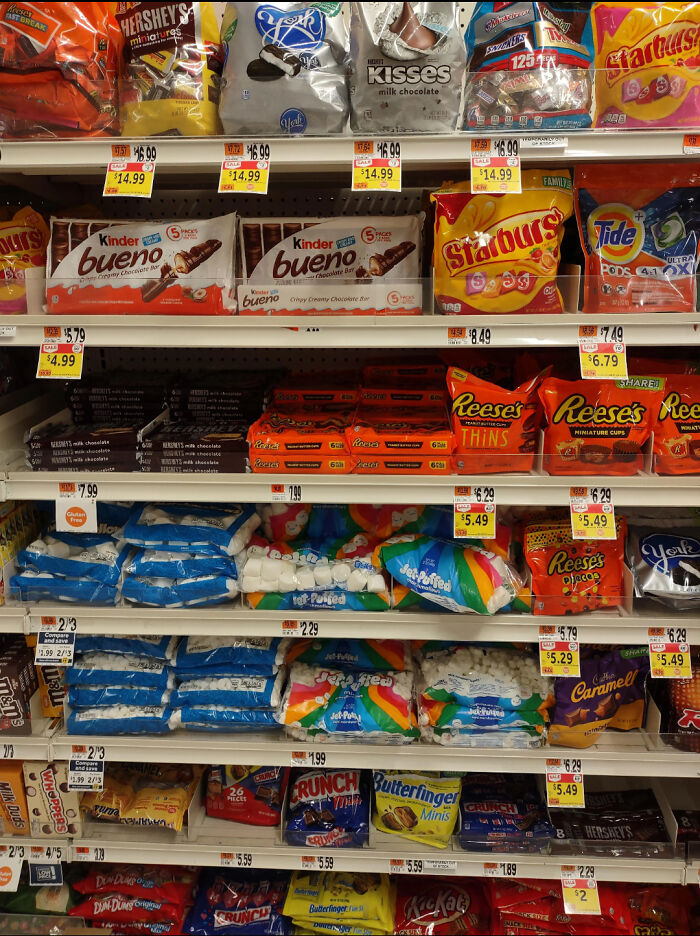 Store shelves filled with candy and snacks including hidden details