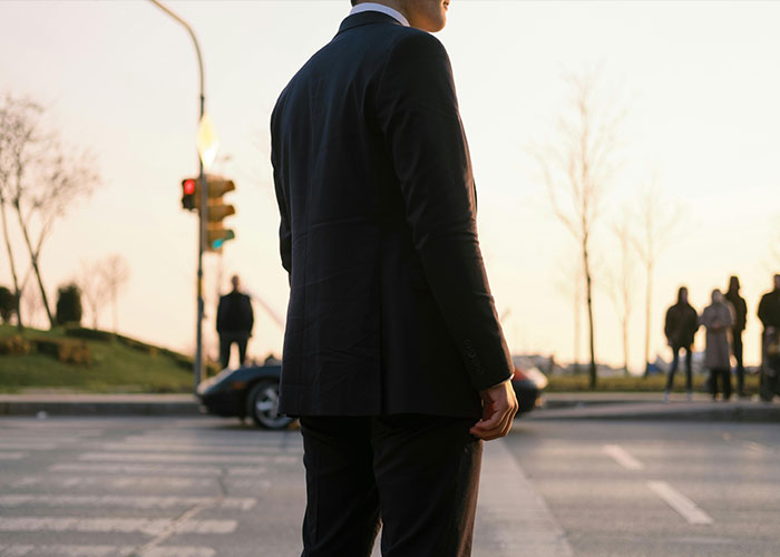 Man standing alone at intersection symbolizing mysterious disappearances