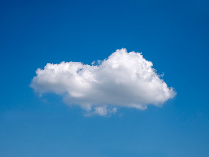 Single white cloud floating in blue sky for statistics concept