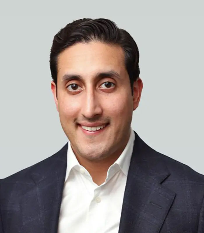 Professional headshot of man connected to JPMorgan wrongful termination lawsuit Professional headshot of man connected to JPMorgan wrongful termination lawsuit