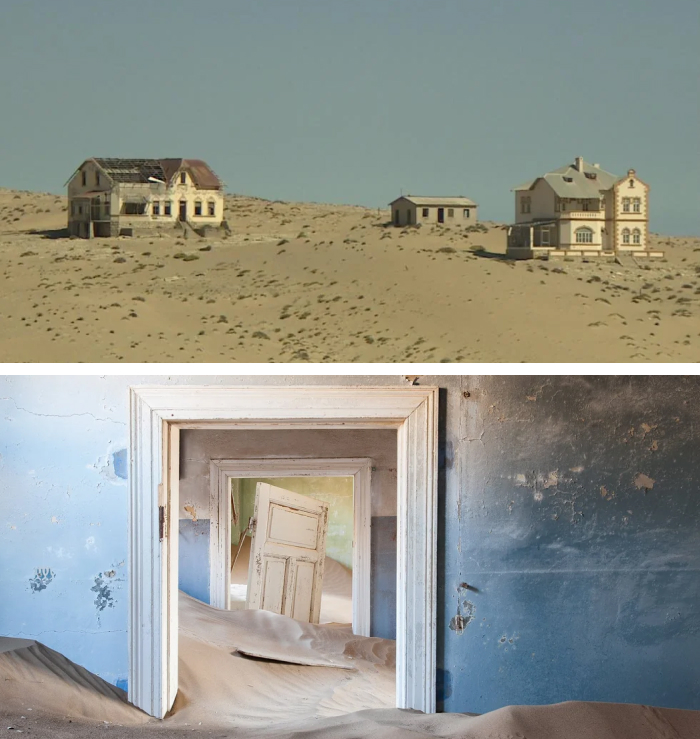 Deserted buildings engulfed by sand dunes in a nature reclaimed landmark