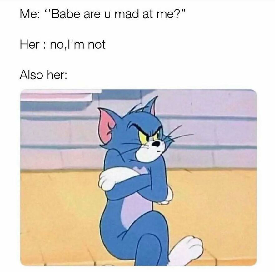 Meme of angry Tom cat illustrating girlfriend mad despite denial