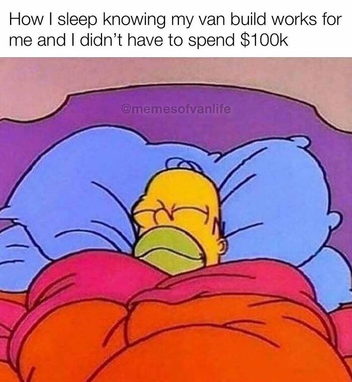 Homer Simpson sleeping peacefully in bed, representing the joy of affordable van life and living out of a van.