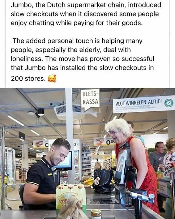 A cheerful senior woman chats with a smiling male cashier at a slow checkout, creating positive posts.