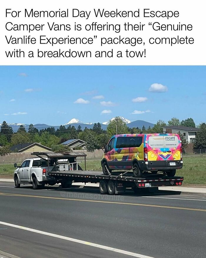 A colorful camper van being towed on a flatbed trailer, highlighting the reality of living out of a van.