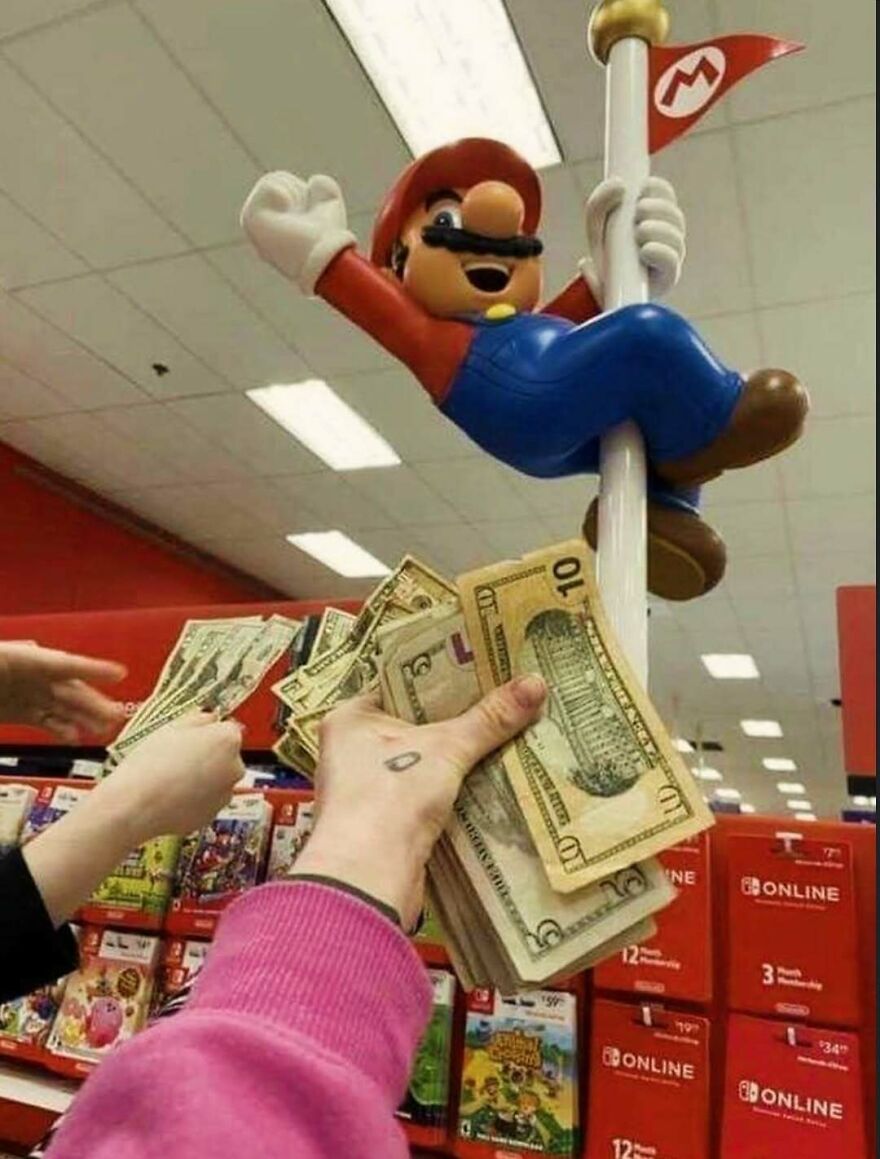 Funny image of people spending money on Mario figure at a store