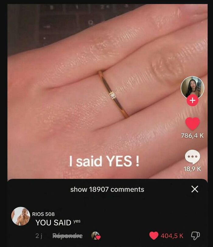 Engagement ring close-up with witty yes comment and reply