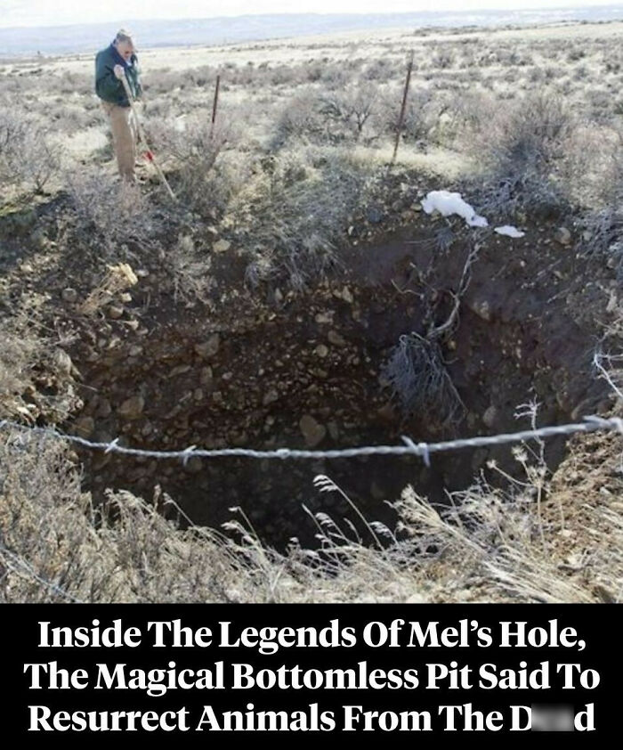 Man standing near Mel's Hole, a legendary bottomless pit in a remote landscape