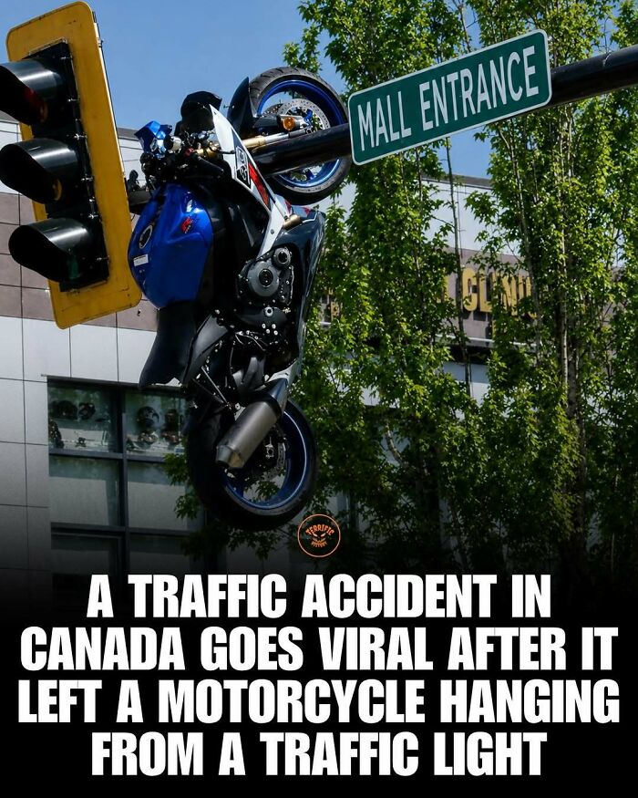 Motorcycle hanging from traffic light after viral traffic accident in Canada