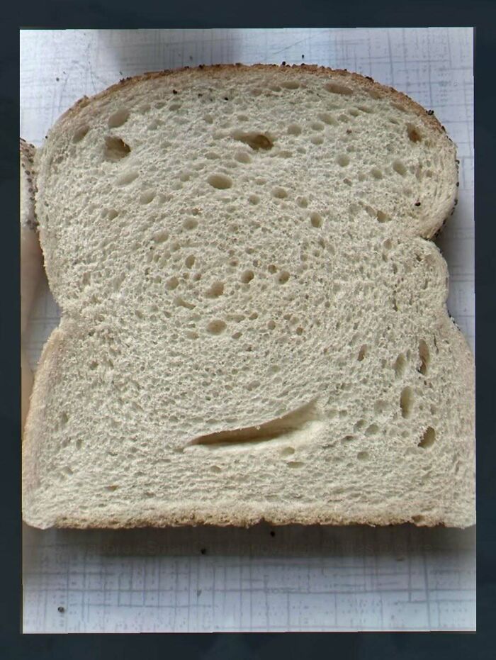 Slice of bread with spiral pattern in the texture of the slice