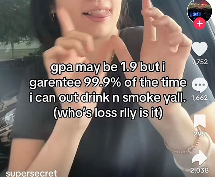 Person making hand gestures with joke about low GPA and drinking, funny random image