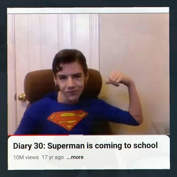Teen flexing arm wearing Superman shirt in funny random images collection