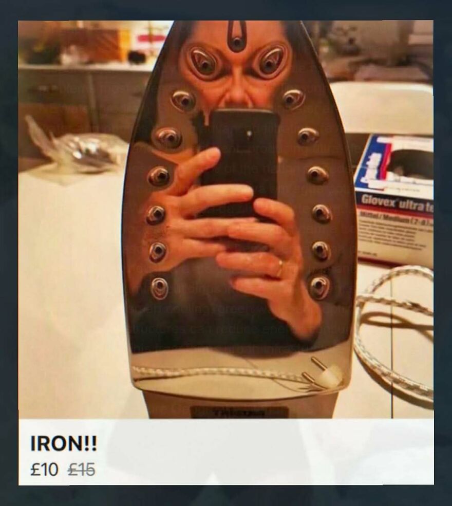 Reflection on an iron creating a distorted multi-eyed face selfie