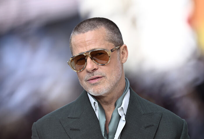 Brad Pitt in sunglasses and a green suit, a focal point amidst courtroom victory speculation and behind-the-scenes emails rumors. Brad Pitt in sunglasses and a green suit, a focal point amidst courtroom victory speculation and behind-the-scenes emails rumors.