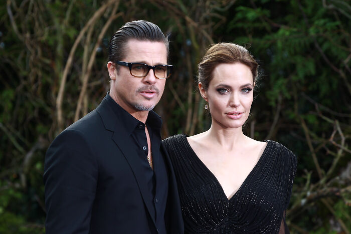Brad Pitt and Angelina Jolie, both dressed in black. Online speculation about emails behind the scenes continues. Brad Pitt and Angelina Jolie, both dressed in black. Online speculation about emails behind the scenes continues.