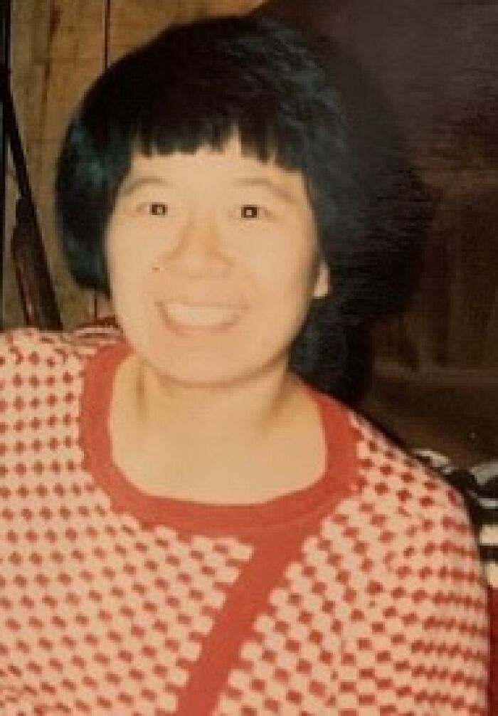 Smiling woman in red patterned sweater linked to creepy strange cases