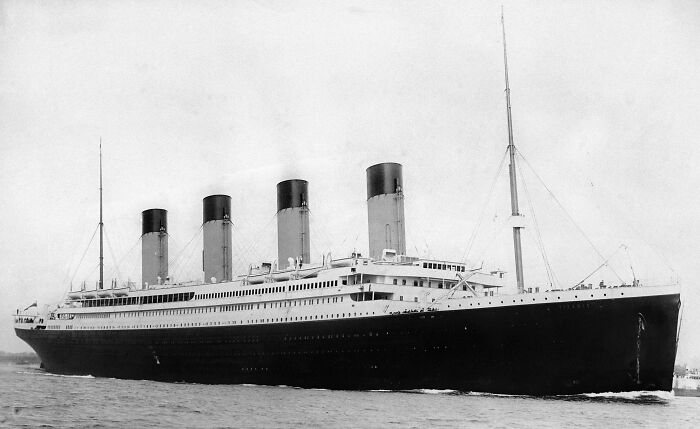 The Titanic, a ship with disturbing d***h stories burned into people's minds, sailing at sea.