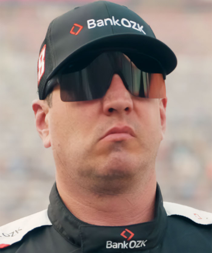 NASCAR star Kyle Busch wearing Bank OZK cap and sunglasses close-up NASCAR star Kyle Busch wearing Bank OZK cap and sunglasses close-up