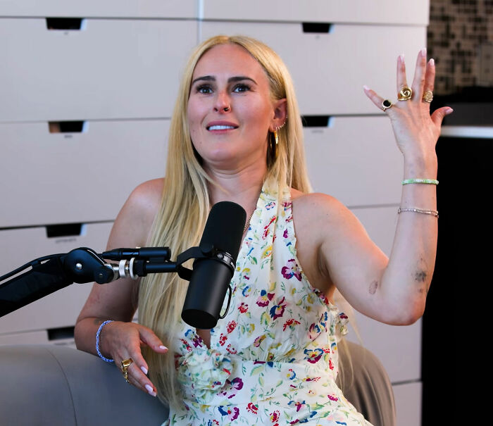 Rumer Willis gesturing during a podcast, discussing the unexpected silver lining of Bruce Willis' dementia battle.