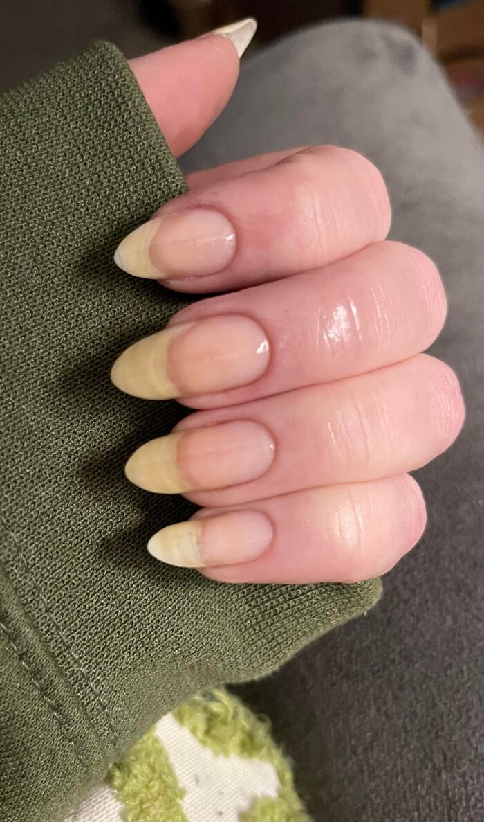 Close-up of fingernails with natural almond shape and shine