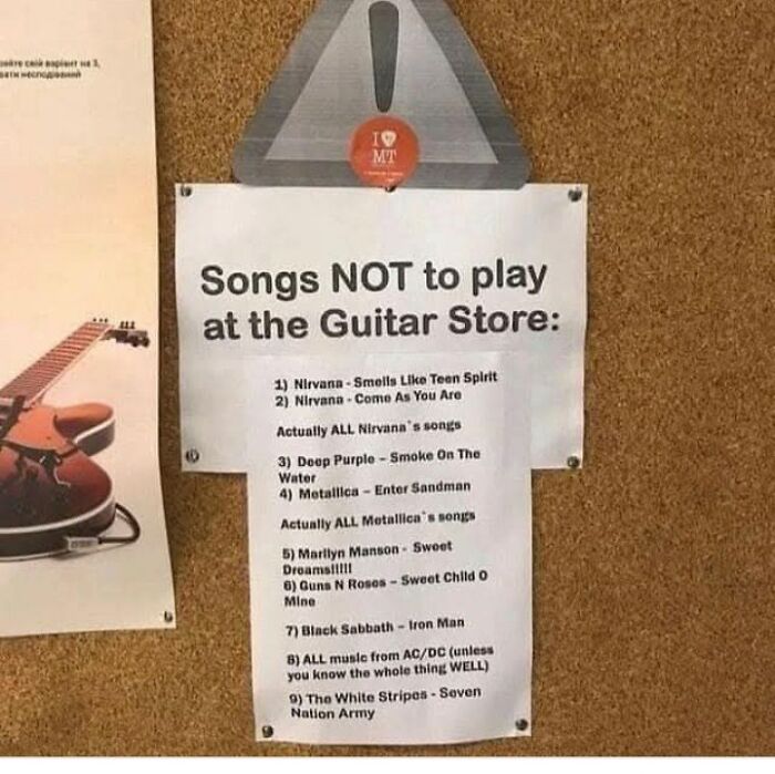 Humorous guitar store sign listing songs not to play including Nirvana and Metallica