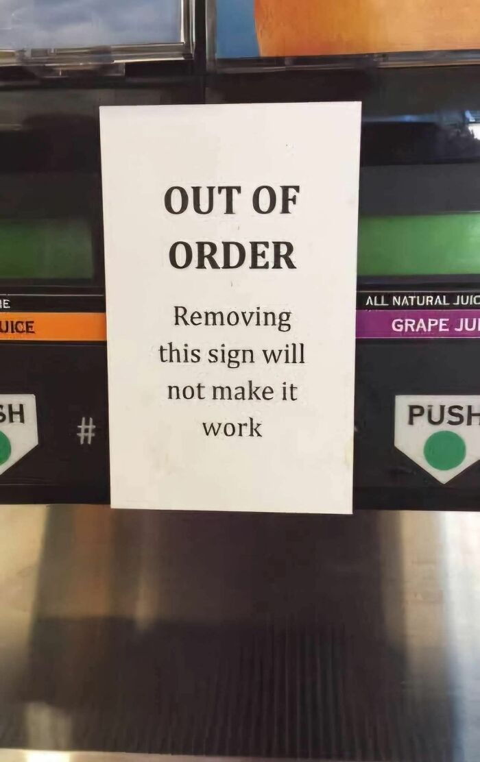 Out of order sign stating removing it will not fix the problem