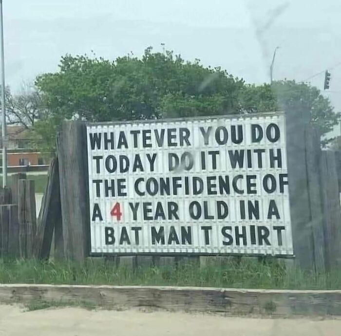 Absurd sign encourages confidence like a 4 year old in a Batman shirt