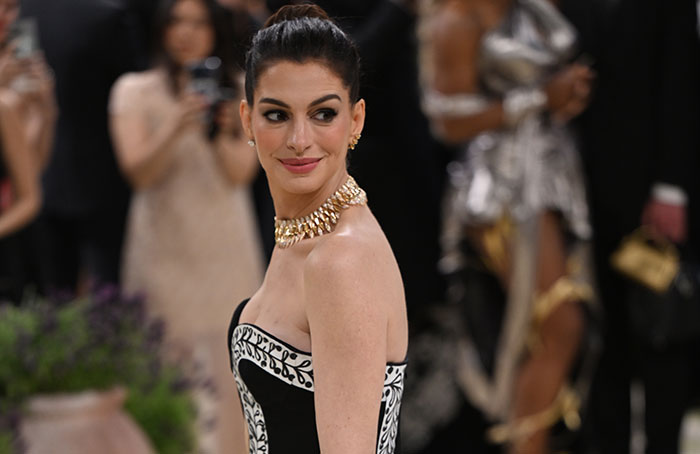 Anne Hathaway elegant at event revealing health battle