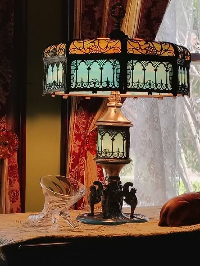 Victorian-style vintage secondhand lamp with intricate metal and glass shade