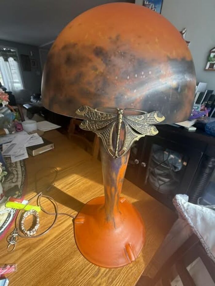 Unique vintage orange lamp with dragonfly decoration on the base