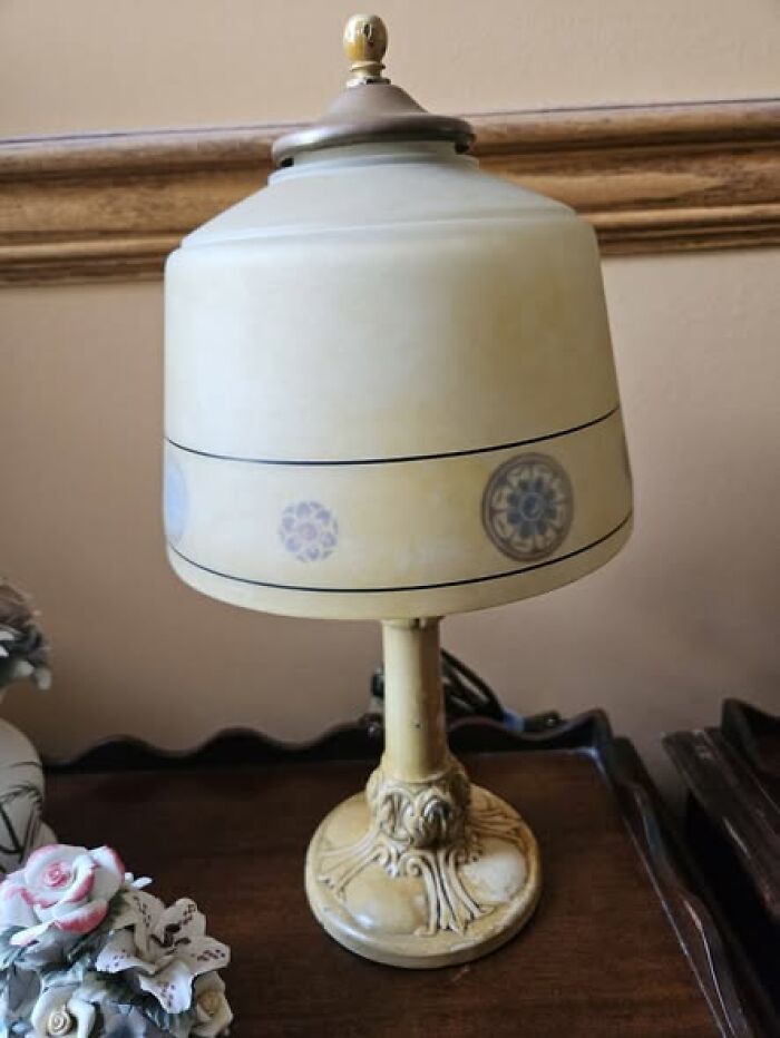Vintage beige lamp with floral pattern on shade and ornate base